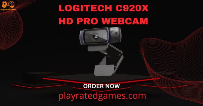 Logitech C920x HD Pro Webcam in black mounted on a monitor, showing its dual microphones and full HD lens.